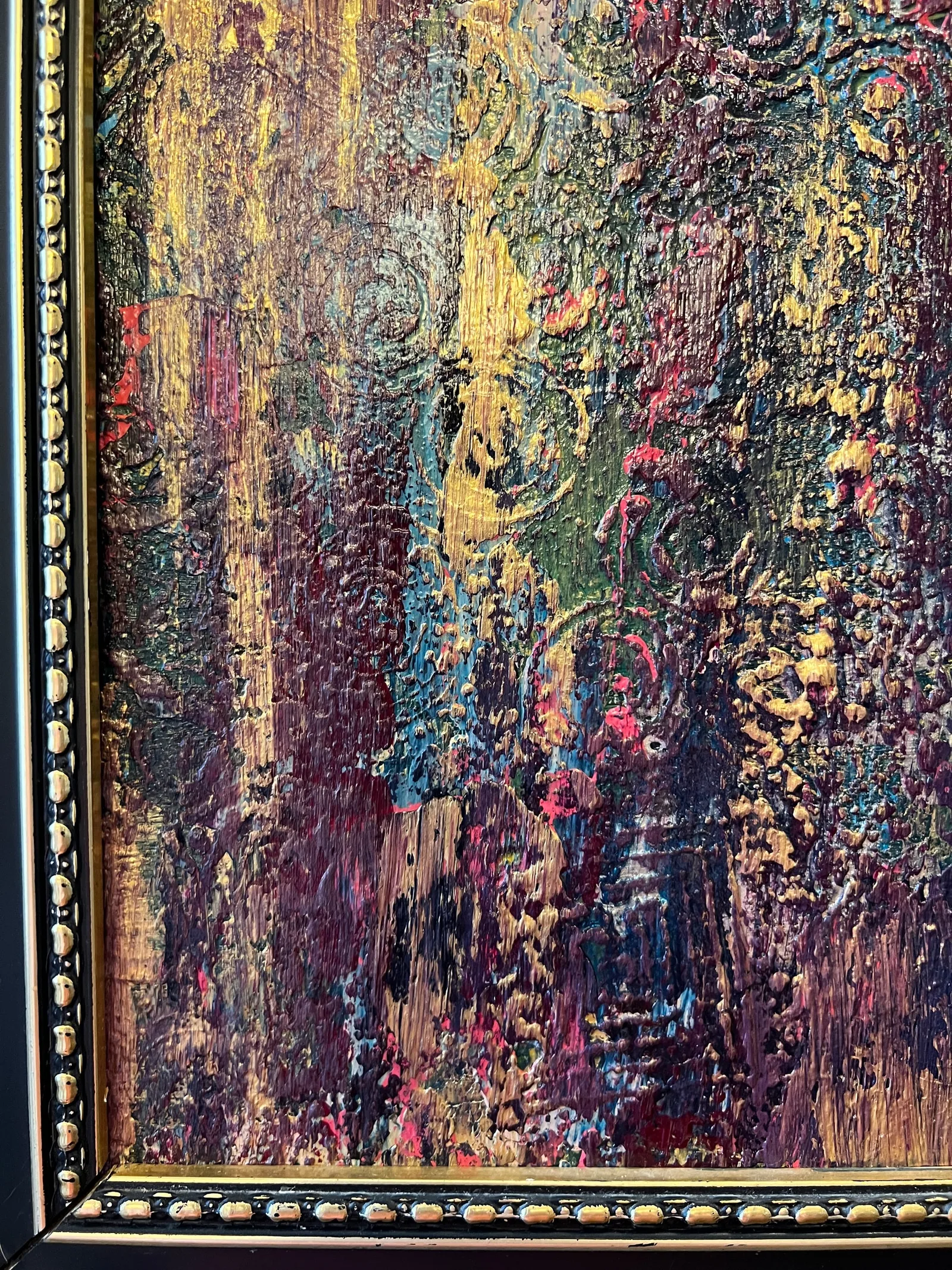 Close-up of the details beside the frame of Embers Through the Rain.