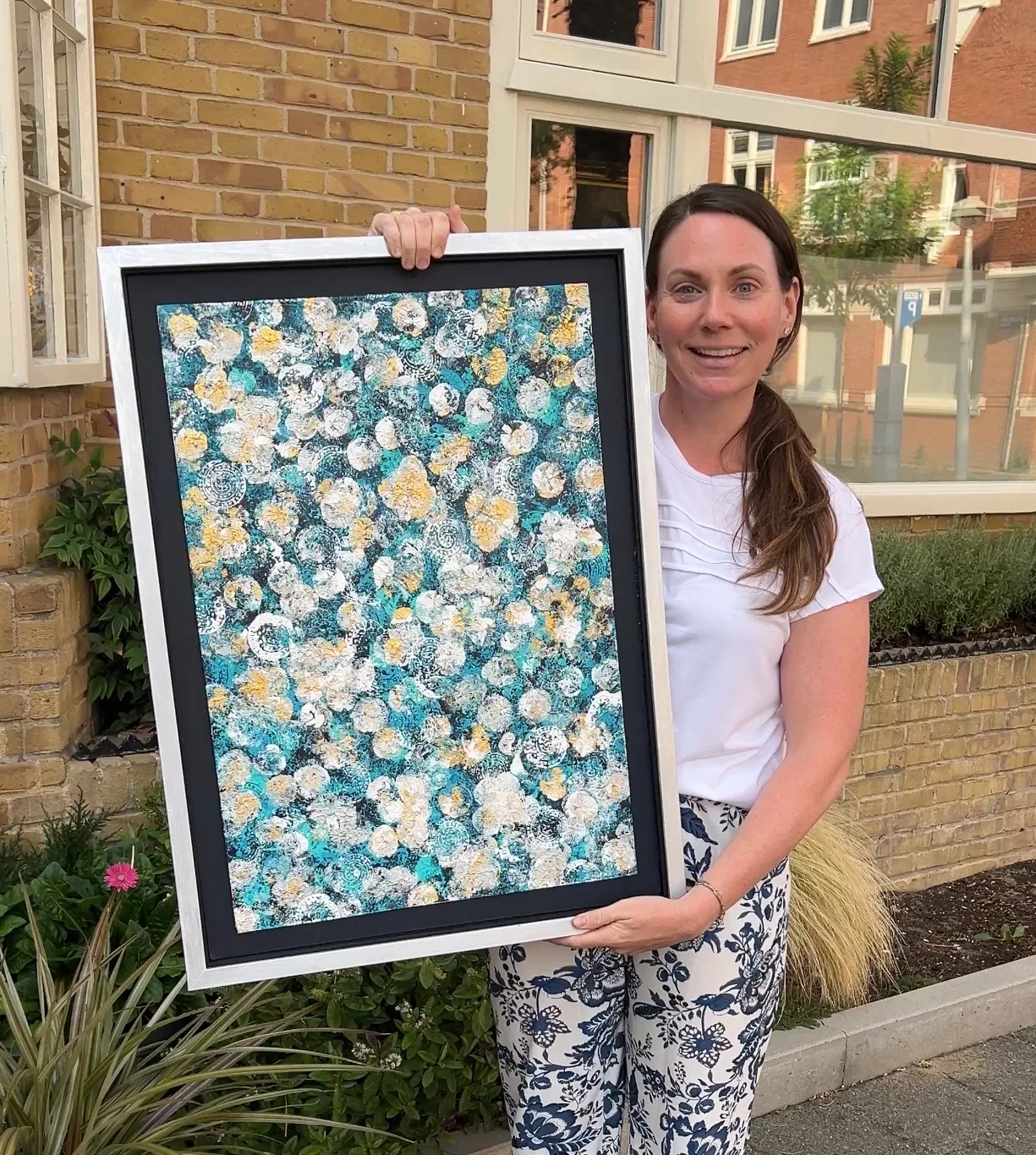 Kelly holding Midnight & Magnolias.